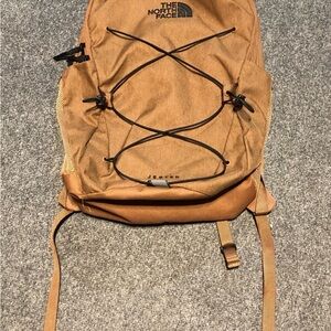 The North Face Jester Backpack in Caramel Brown with Black Bungee